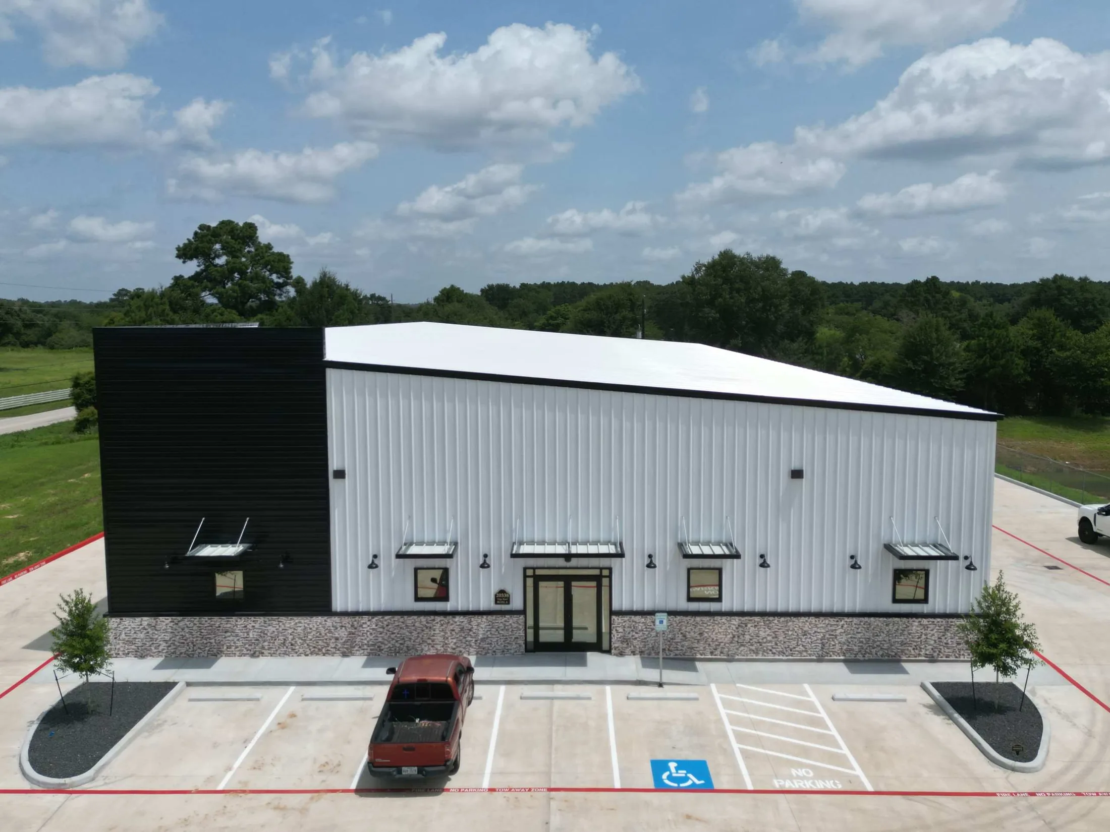 Front elevation of a completed commercial metal building