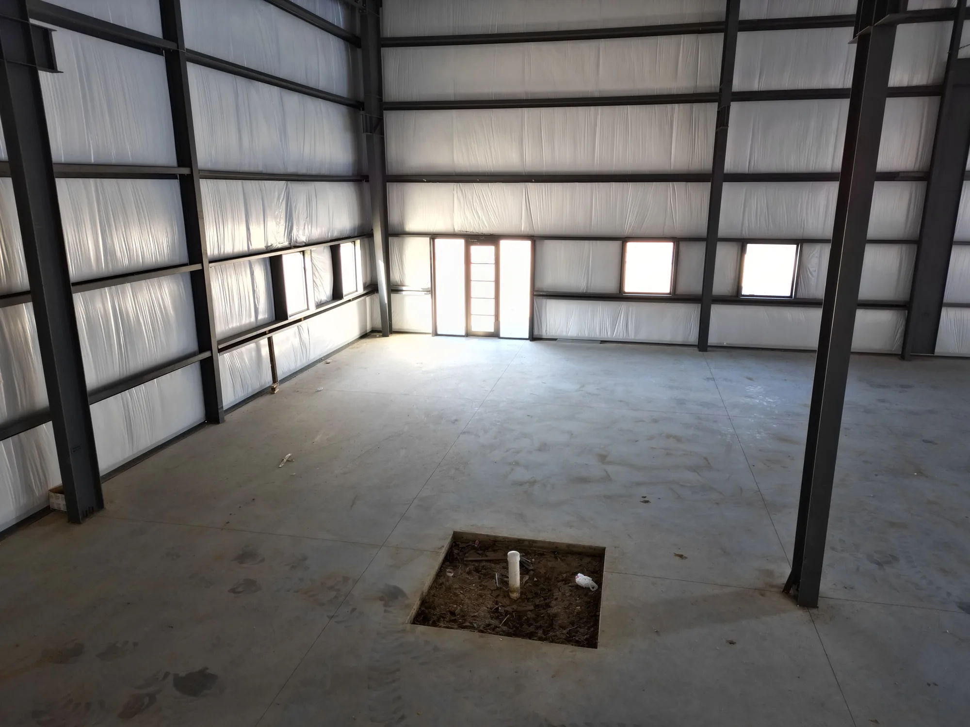 Open industrial shell interior at Telge Phase 1B