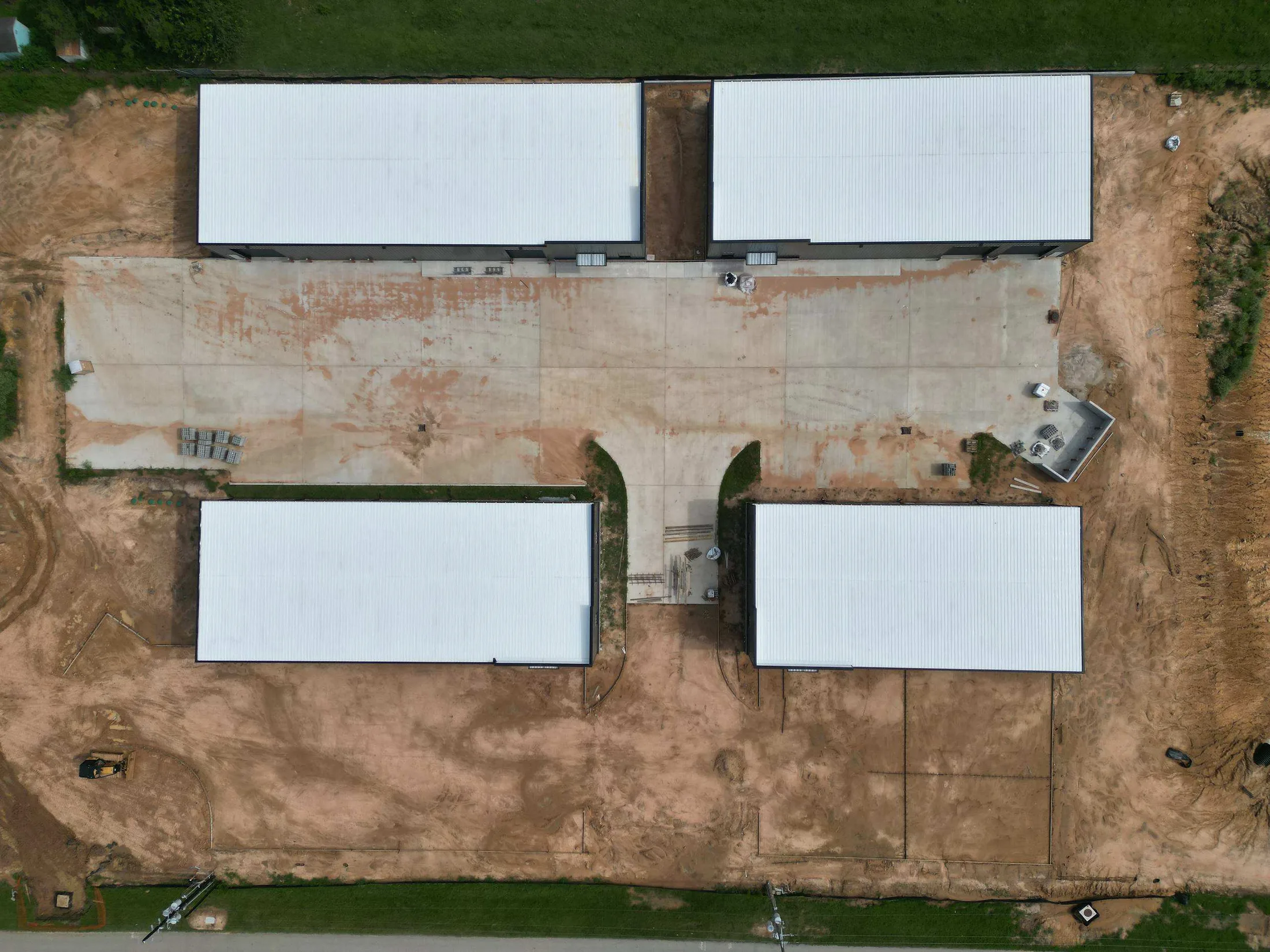 Top-down view of a four-building industrial development